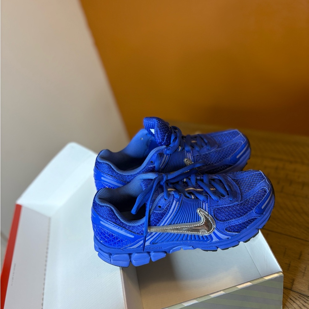 Nike Blue Sneakers with Silver Swoosh